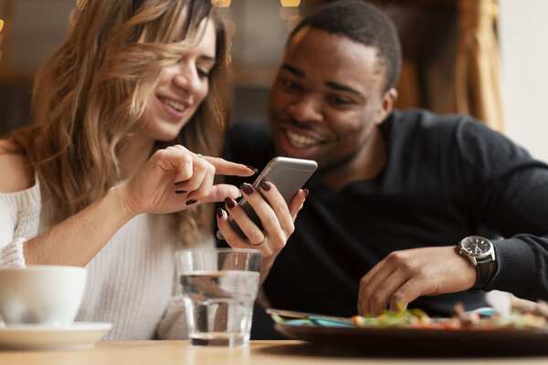 Couple using an mobile